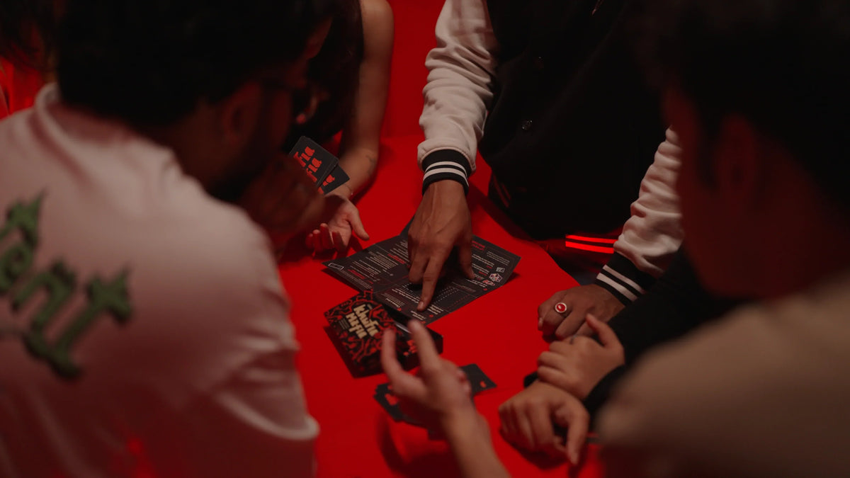 Large group playing Khufia Mafia card game