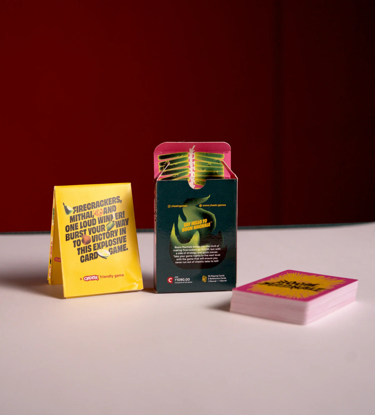 Open Boom Machale box displayed with its yellow manual and stack of cards
