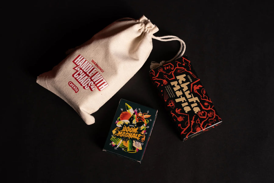 Boom Machale, Khufia Mafia and the Cheatr bag arranged on a black background